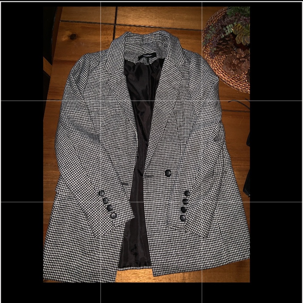 A plaid print blazer